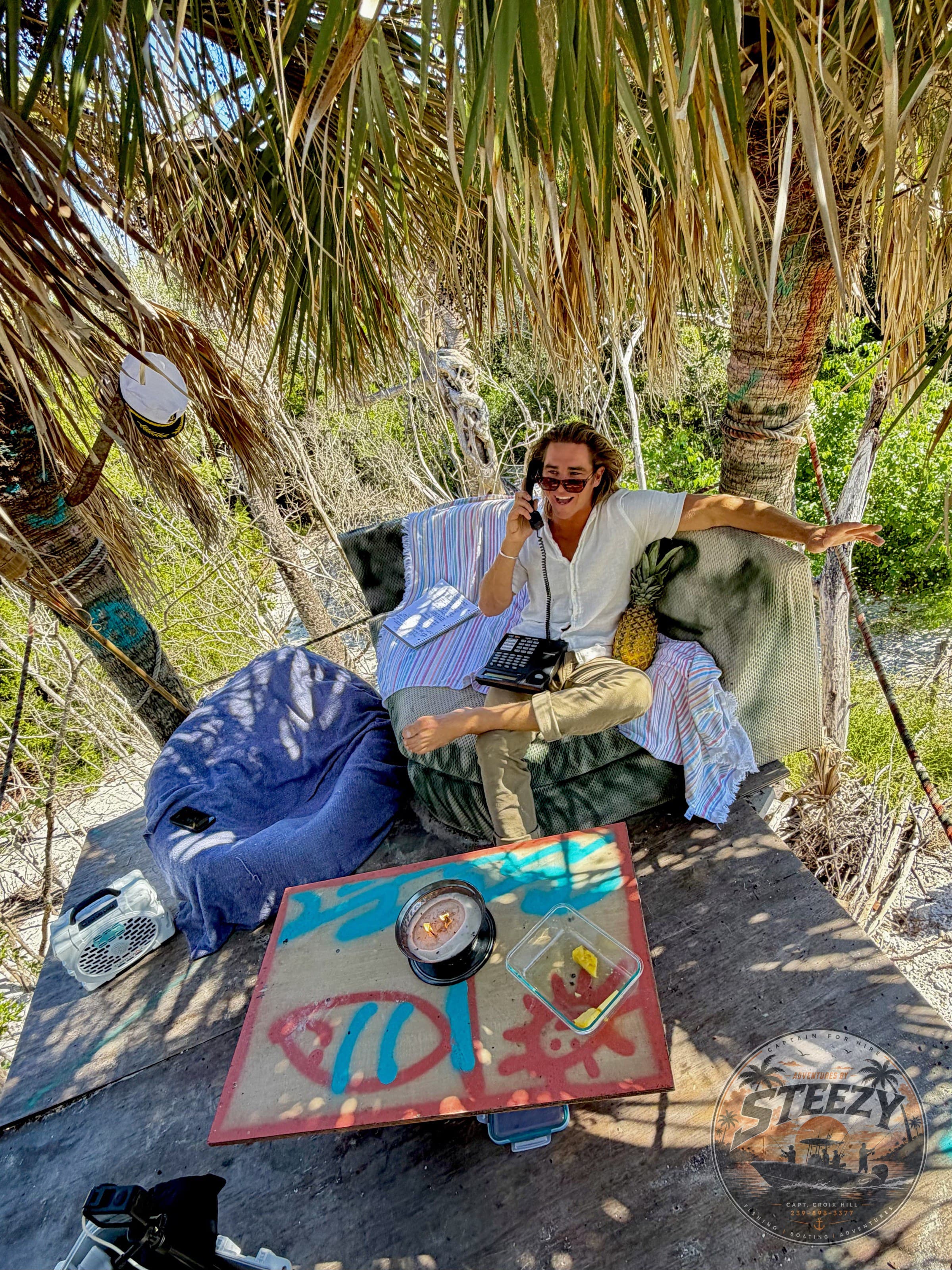 Captain Croix's 22' Aquasport beached on a remote Naples-area sandbar